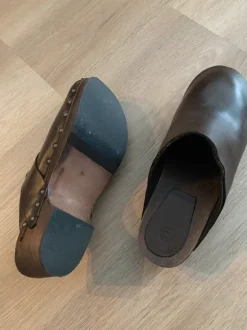 Brown clogs