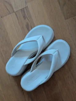 Comfortable white wedge mules