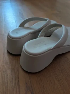 Comfortable white wedge mules