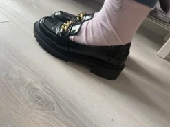 Even&Odd black chunky loafers with gold chain