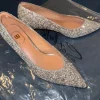 glitzernde Spitzpumps