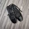 H&M Mary-Jane Ballerinas – Schwarz Lackoptik (Goldene Details)