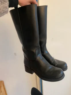 Knee high black boots