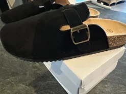 Mules noires