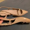 Nude slingback kitten heel
