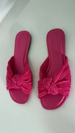 Roze nieuwe slippers met knoop van Primark