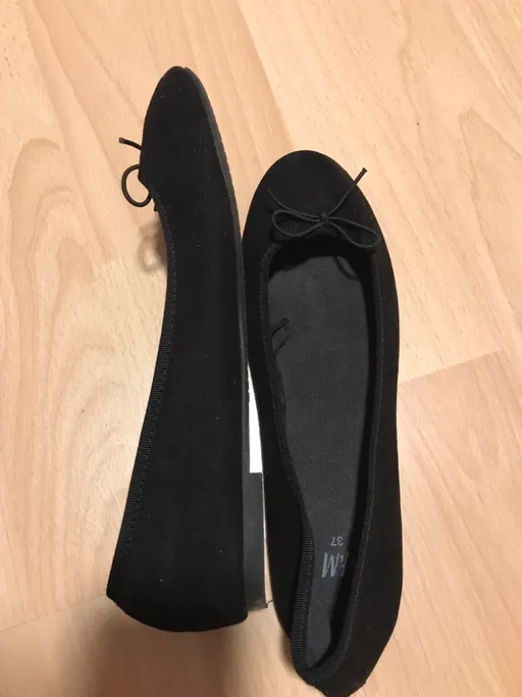 Schwarze Ballerinas