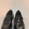 Schwarze Lack-Loafer / Penny Loafer