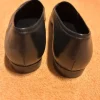 Schwarze Slipper