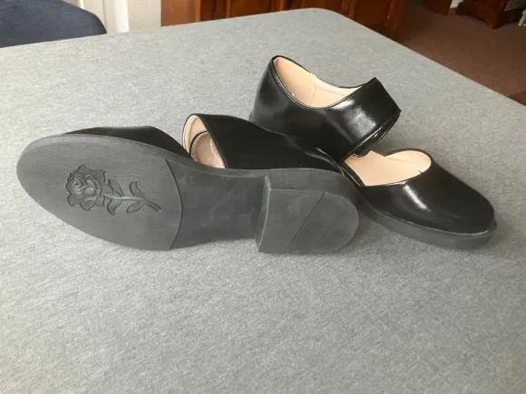 Schwarze Spangenschuhe Größe 39