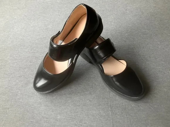 Schwarze Spangenschuhe Größe 39