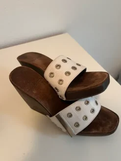 White leather platform sandals with silver eyelets