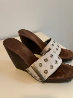 White leather platform sandals with silver eyelets